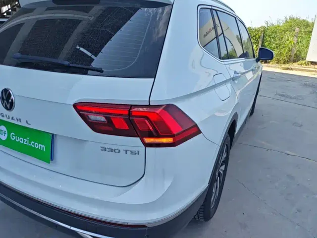Volkswagen Tiguan L — Фото автомобиля 7