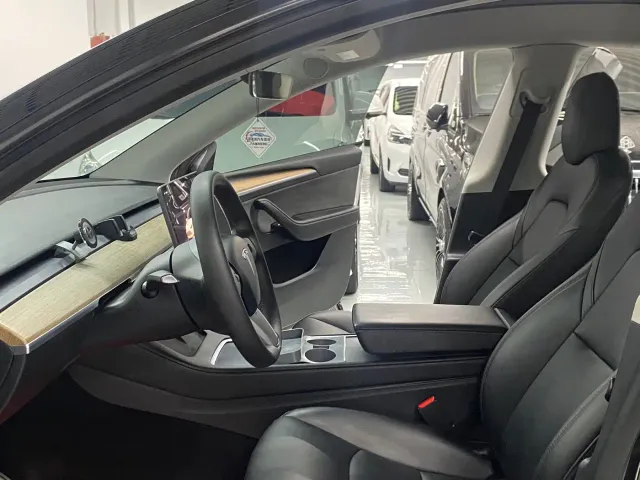 Tesla Model Y — Фото автомобиля 5