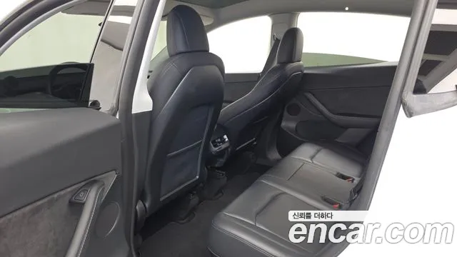 Tesla Model Y — Фото автомобиля 26