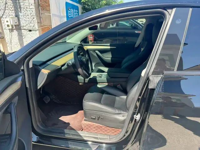 Tesla Model Y — Фото автомобиля 3