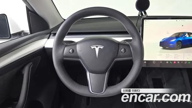 Tesla Model Y — Фото автомобиля 18