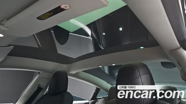 Tesla Model 3 — Фото автомобиля 14