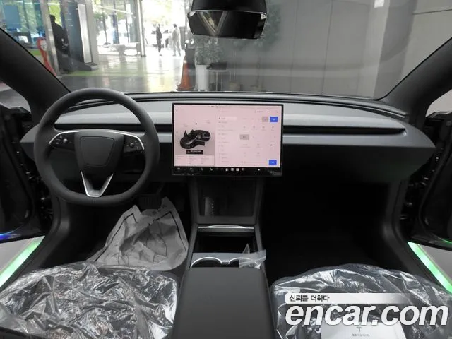 Tesla Model 3 — Фото автомобиля 7