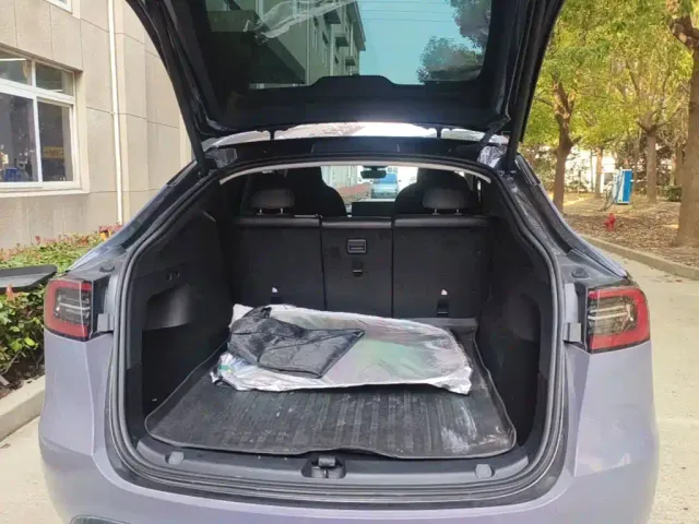 Tesla Model Y — Фото автомобиля 18