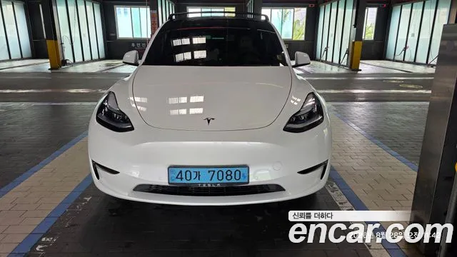 Tesla Model Y — Фото автомобиля 3