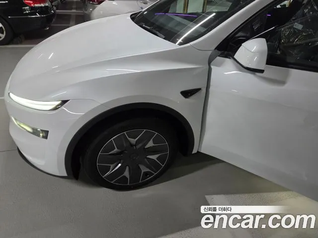Tesla Model Y — Фото автомобиля 2