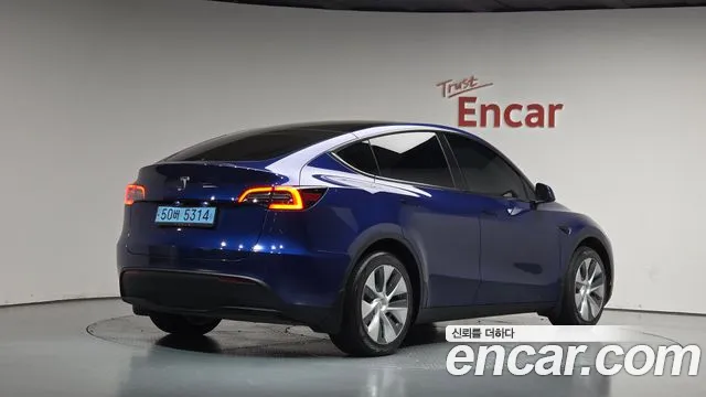 Tesla Model Y — Фото автомобиля 2