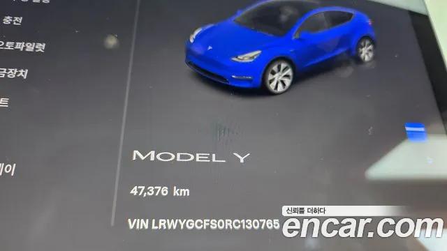 Tesla Model Y — Фото автомобиля 11