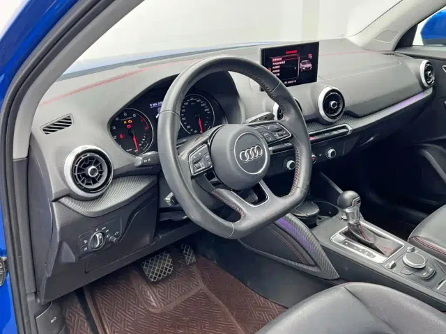 Audi Q2L — Фото автомобиля 13