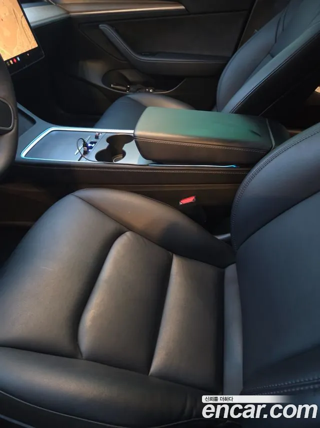 Tesla Model 3 — Фото автомобиля 14