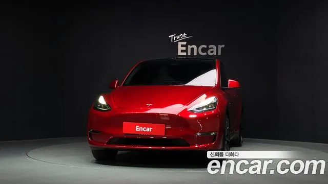 Tesla Model Y — Фото автомобиля 3