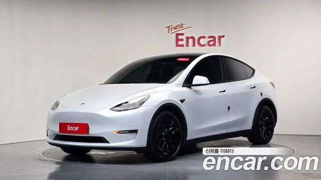 Tesla Model Y — Фото автомобиля 8