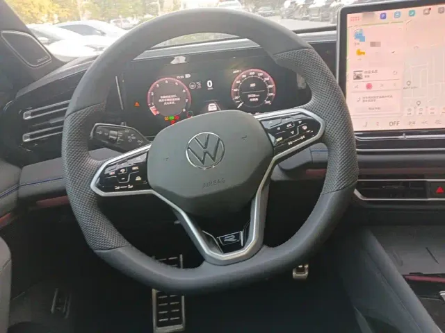Volkswagen Tiguan L — Фото автомобиля 11