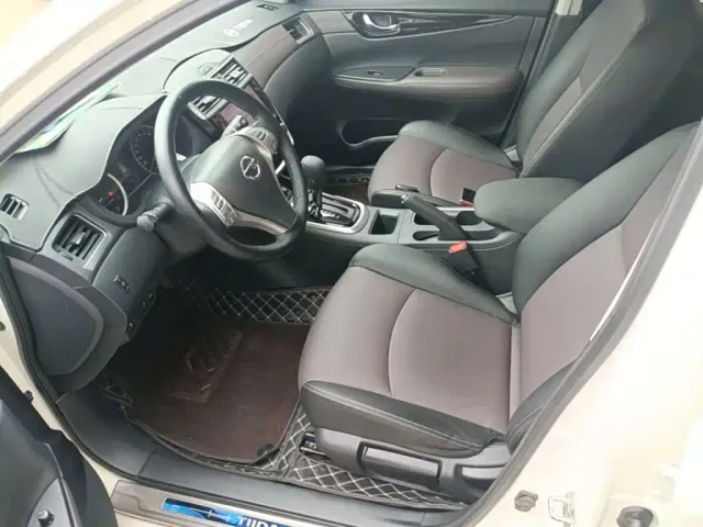 Nissan Tiida — Фото автомобиля 14
