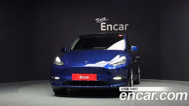 Tesla Model Y — Фото автомобиля 3