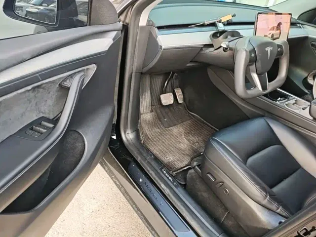 Tesla Model Y — Фото автомобиля 15