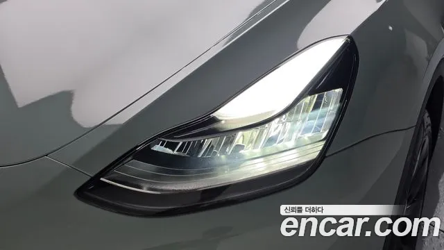 Tesla Model Y — Фото автомобиля 7