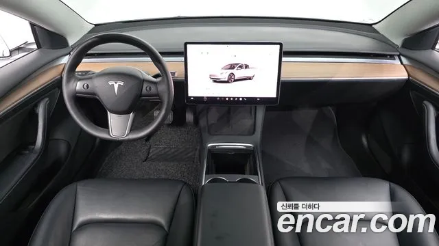 Tesla Model 3 — Фото автомобиля 6