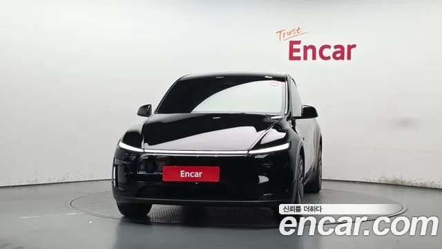 Tesla Model Y — Фото автомобиля 3