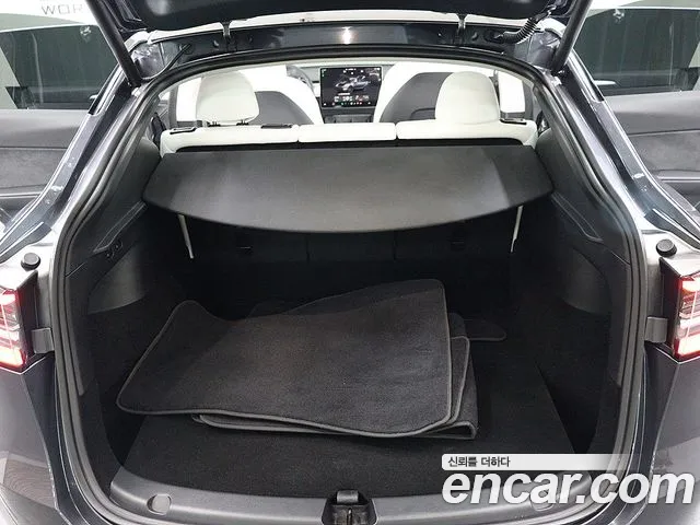 Tesla Model Y — Фото автомобиля 18