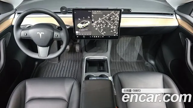 Tesla Model Y — Фото автомобиля 9