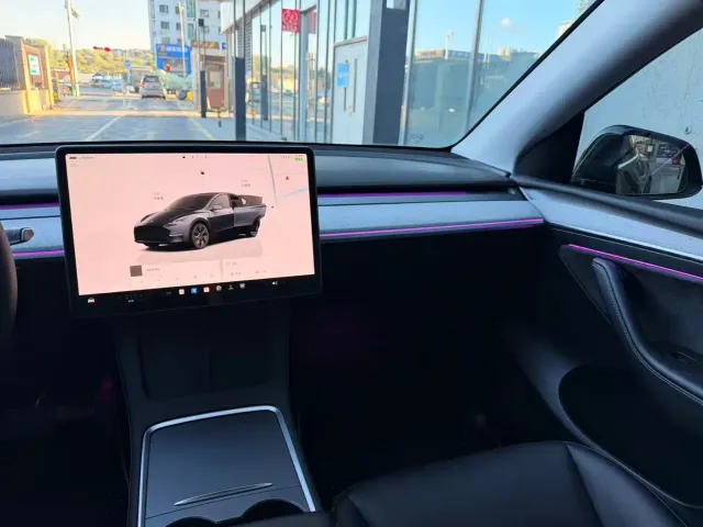Tesla Model Y — Фото автомобиля 6