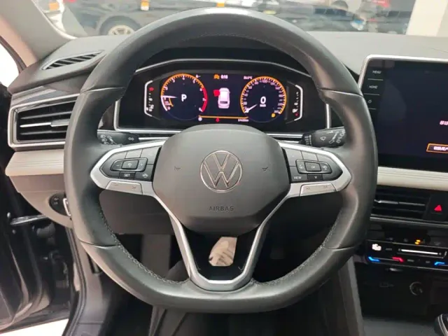 Volkswagen Tiguan L — Фото автомобиля 10