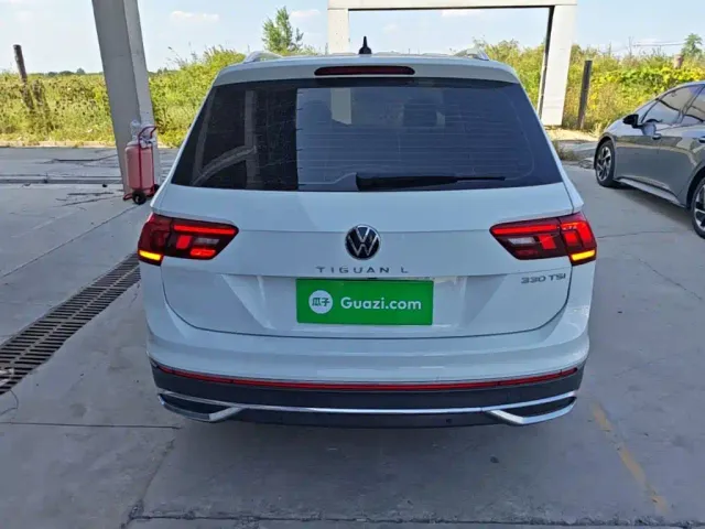 Volkswagen Tiguan L — Фото автомобиля 5