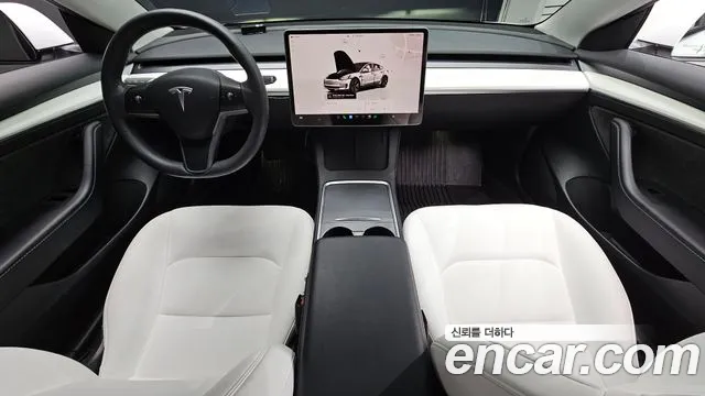 Tesla Model 3 — Фото автомобиля 9