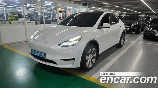 Tesla Model Y — Фото автомобиля 7