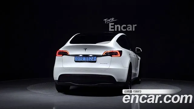 Tesla Model Y — Фото автомобиля 4