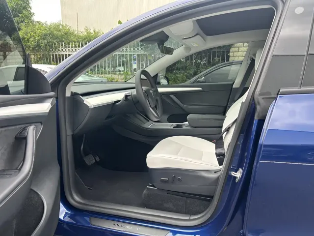 Tesla Model Y — Фото автомобиля 4