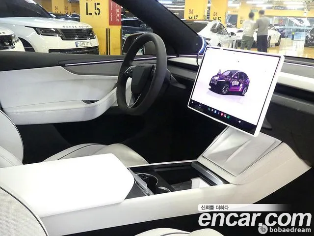 Tesla Model Y — Фото автомобиля 19