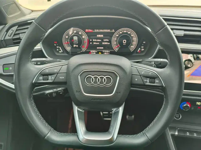 Audi Q3 — Фото автомобиля 11