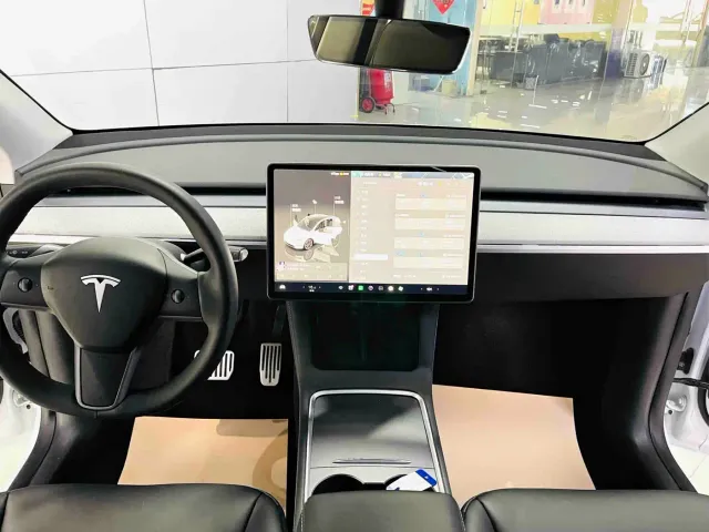 Tesla Model Y — Фото автомобиля 7