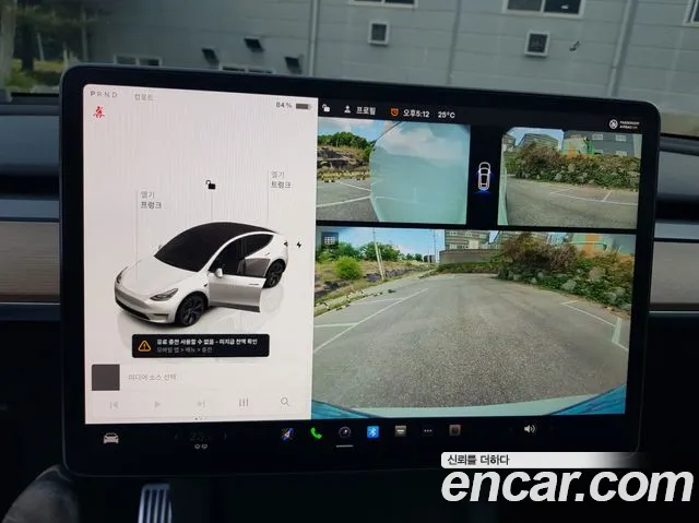 Tesla Model Y — Фото автомобиля 13