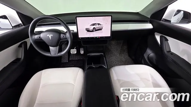 Tesla Model Y — Фото автомобиля 10