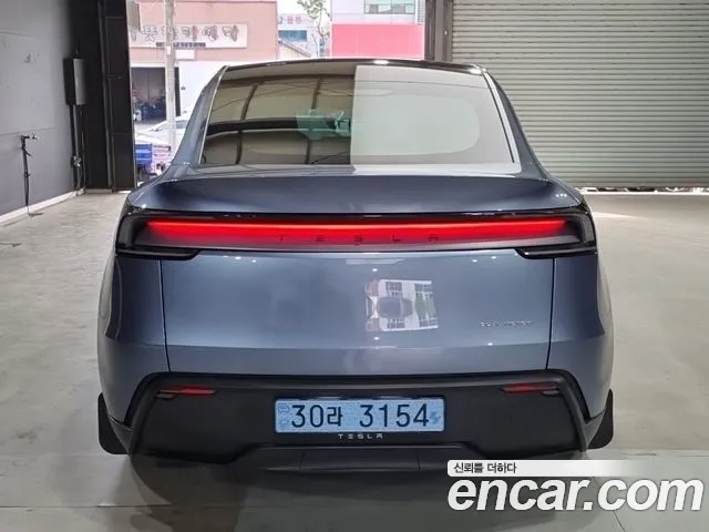 Tesla Model Y — Фото автомобиля 4