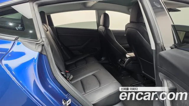 Tesla Model 3 — Фото автомобиля 11