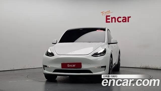 Tesla Model Y — Фото автомобиля 3