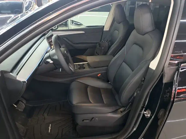 Tesla Model Y — Фото автомобиля 14