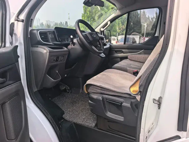 Ford Transit 2023 2.0T Petrol Auto Business Travel Mid-Axis Mid-Roof 10/11/12-seater — Фото автомобиля 4