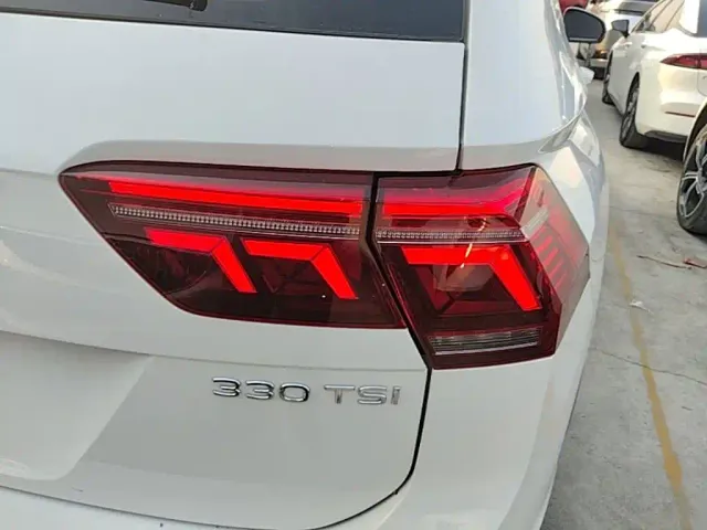 Volkswagen Tiguan L — Фото автомобиля 7