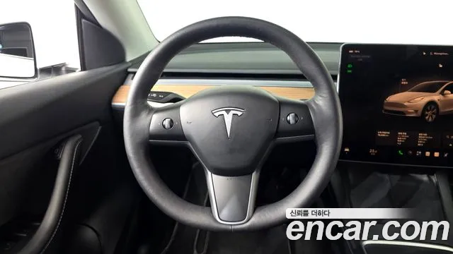 Tesla Model Y — Фото автомобиля 19