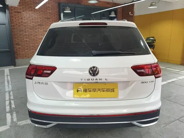 Volkswagen Tiguan L — Фото автомобиля 8