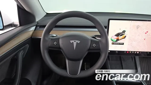 Tesla Model Y — Фото автомобиля 12