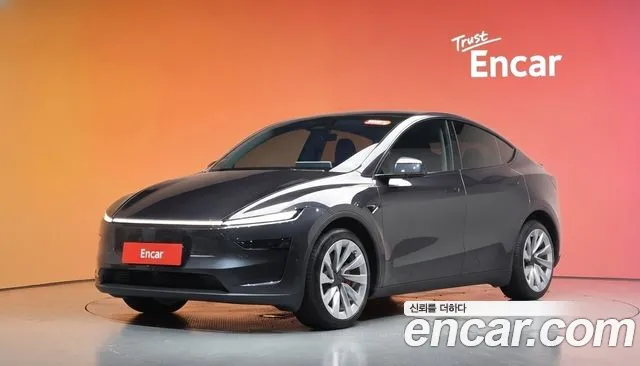 Tesla Model Y — Фото автомобиля 9