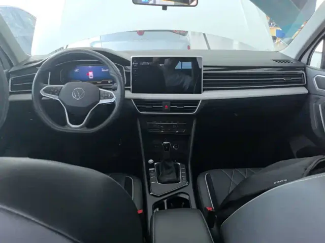 Volkswagen Tiguan L — Фото автомобиля 9