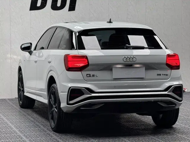 Audi Q2L — Фото автомобиля 11
