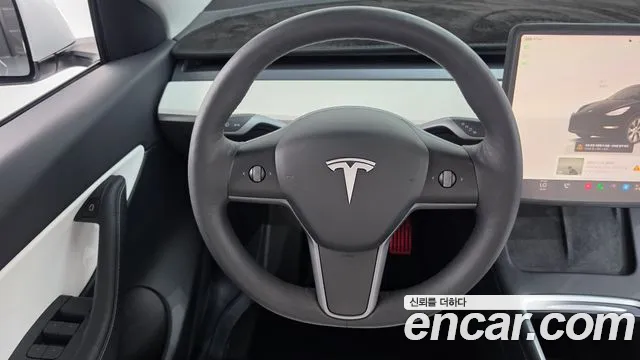 Tesla Model Y — Фото автомобиля 14